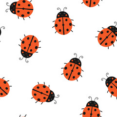 Fototapeta premium Cute seamless pattern with adorable ladybugs. Vector illustration on white background. It can be used for wallpapers, wrapping, cards, patterns for clothes and other.