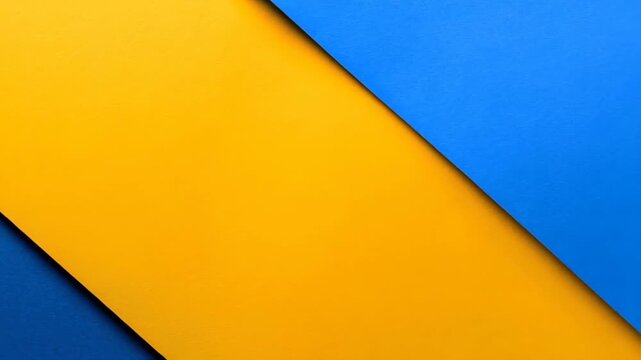 Geometric Harmony of Colors: Abstract composition showcases the interplay of vibrant yellow and blue planes, offering a dynamic and eye-catching visual experience.