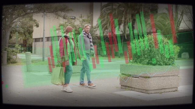 Couple walking nearing planter and showing red or green bars, woman checking device for maps via tec