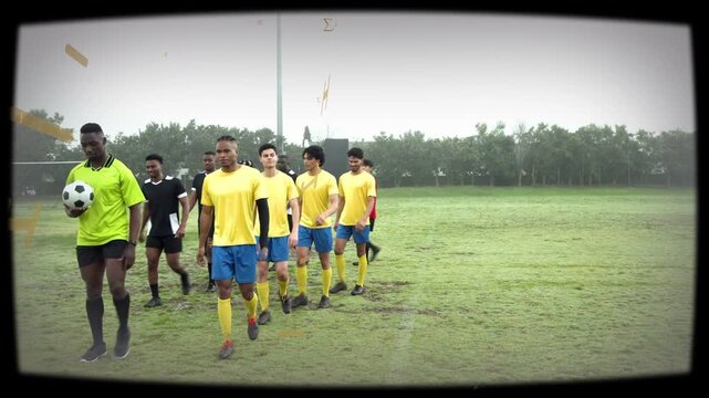 Referee leading ball, players walking in line across pitch, golden overlay accenting soccer pregame