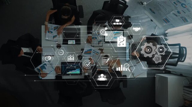 A collaborative meeting scene showcasing professionals discussing strategies, surrounded by digital icons representing data analysis and workflow in a modern office environment. Raster