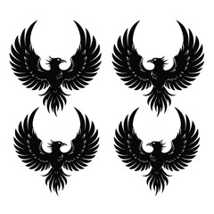 Fototapeta premium Set of four black eagle silhouettes with wings spread wide.