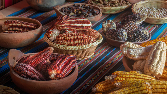 Peruvian corn varieties in clay bowls traditional Andean food market