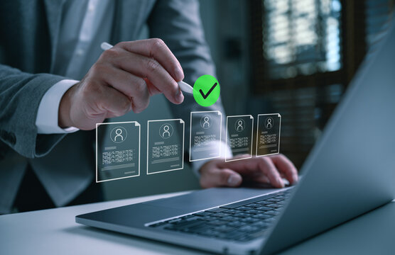 HR manager using laptop to select candidates with virtual profile icons and check mark. Concept of recruitment process, human resources management, employee hiring, and career choice.