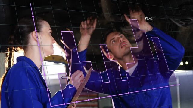 Male tech reaching up inspecting under lifted auto, female tech noting, purple grid tracking parts