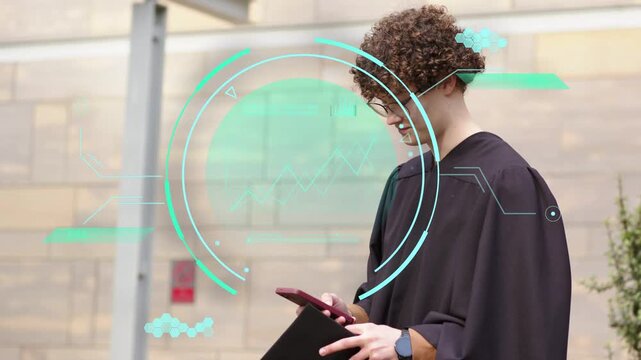 Male student checking phone by stone wall, teal HUD overlaying torso while preparing graduation cap
