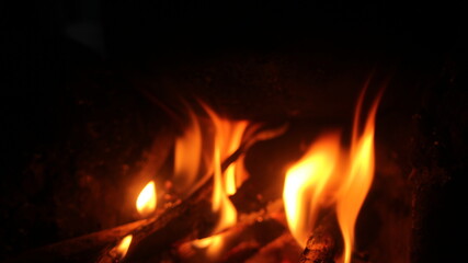 Fototapeta premium a dark fireplace with glowing embers. 