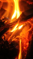 Fototapeta premium a dark fireplace with glowing embers. 