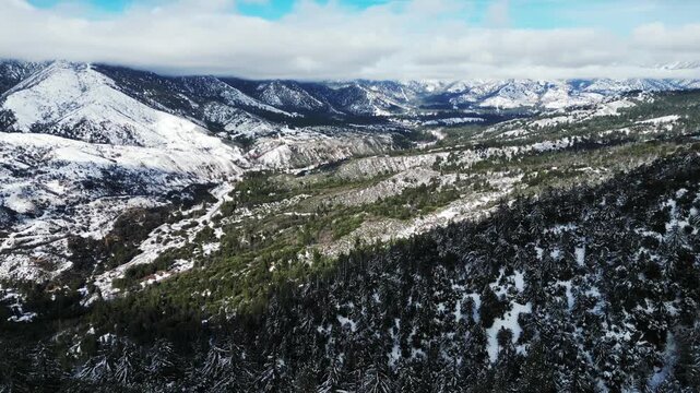 The California San Gorgonio San Bernardino Mountain Range near the Santa  Ana Watershed covered in snow along SR 38 through the Mountain Pass