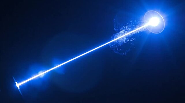 A bright blue beam of light is emitted from a small, circular device in the darkness