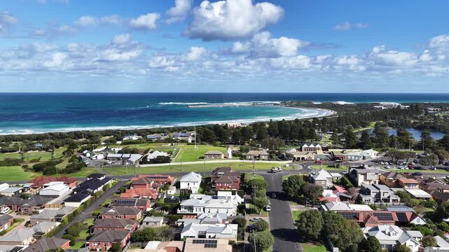 Warrnambool, Victoria, Australia: 4K aerial drone footage of coastal town, sandy beaches, ocean waves, wetlands, E Johnson Reserve, river inlets and urban landscape with houses, shops and streets