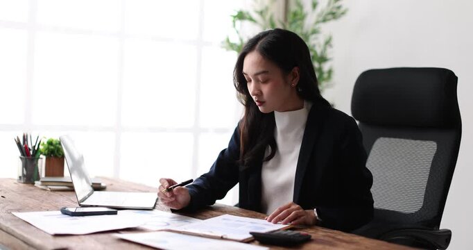 Documents, laptop and businesswoman in office with research for finance report with budget plan. Computer, reading and female financial manager with paperwork for investment proposal in workplace.
