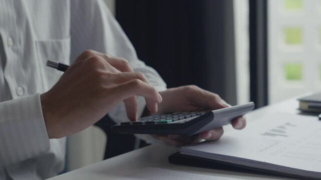 Auditor Reviewing Financial Statement for Accuracy