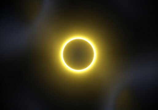 A glowing ring of light resembling a solar eclipse against a dark background