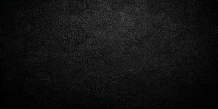 A dark black grunge background featuring a rough textured surface of old leather material and gray paper pattern for a macro design backdrop