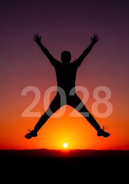 Person jumping for joy silhouetted against a vibrant sunset with the year 2028 prominently displayed in the foreground.