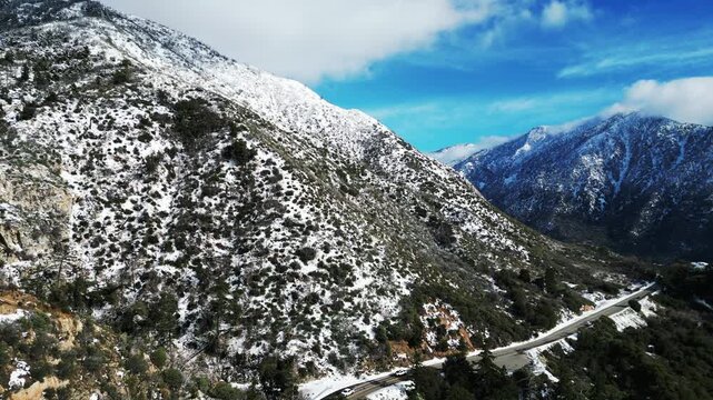 The California San Gorgonio San Bernardino Mountain Range near the Santa  Ana Watershed covered in snow along SR 38 through the Mountain Pass