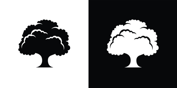Black and white tree silhouettes on split color background symbol 2