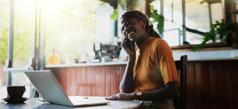 Black woman, phone call and laptop in coffee shop for laugh, conversation and remote work. Consultant, funny joke and freelancer in cafe with tech for project, chat or networking in small business