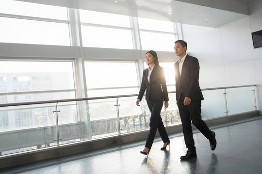 business people walking in the airport