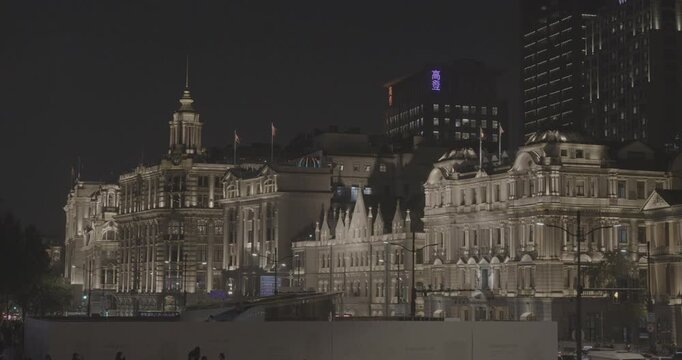 Shanghai, China. Night view Union Building and China Merchants Bank Building in Shanghai showcases classic architectural details at night. Great Northern Telegraph Building