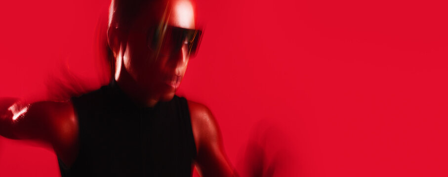 Fitness, motion blur or woman in studio with sprint, intense cardio or stamina exercise in speed activity. Banner, mockup or person with space, fast run or endurance workout on red background.