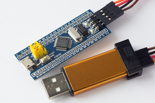 Programming board of STM32 in blue color isolated in white background