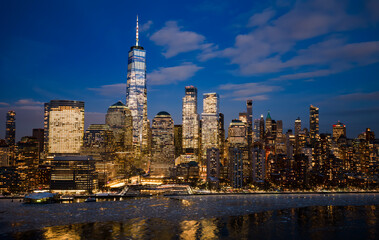 Fototapeta premium New York city night view. New York skyline night panorama. New York glowing skyline night. New York Manhattan night.