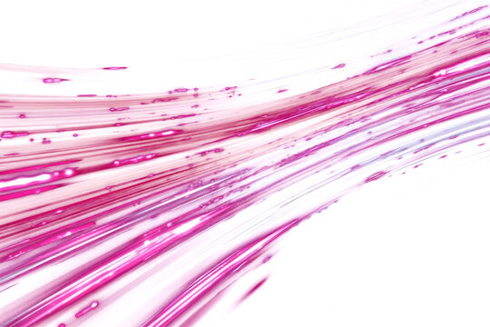 Bright pink light streaks across dark background with glowing particles, abstract
