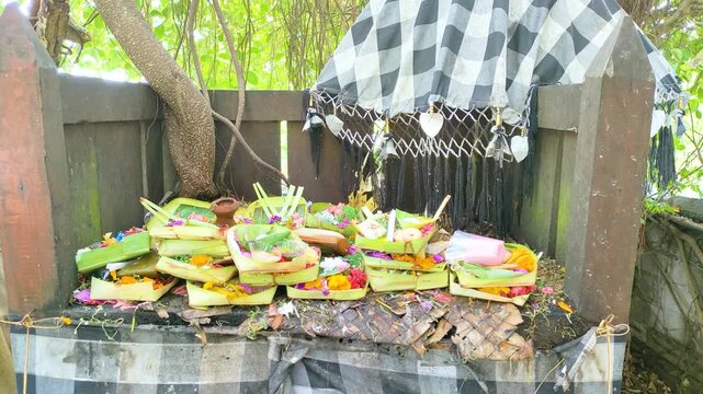Canang Sari offerings placed in a small sacred place or place of worship