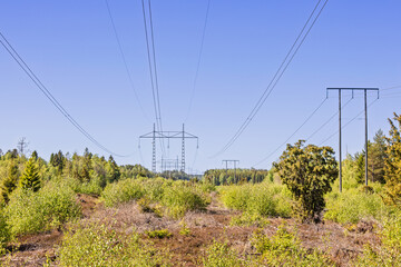 Obraz premium High voltage power line in the landscape a sunny spring day