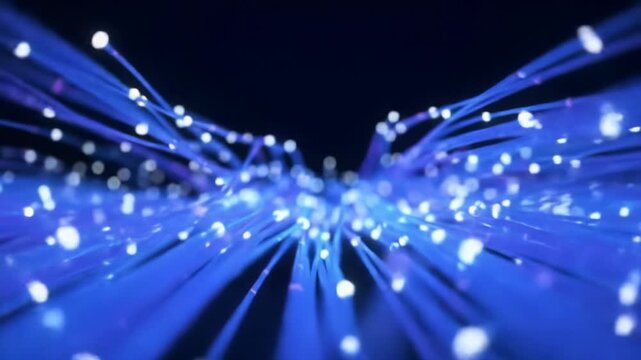 Luminous blue, purple fiber-optic strands intertwine, guiding through infinite digital space with sparkling white particles, a deep dark immersive background, and a subtle dolly push-in. Concept of