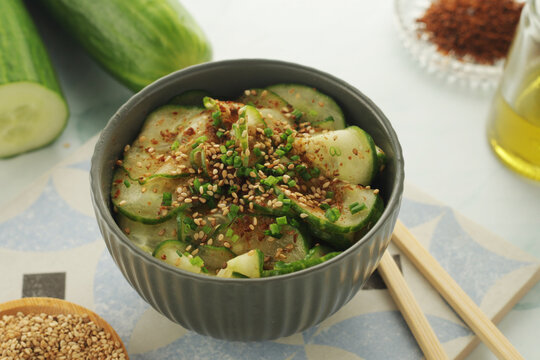 A bowl with Korean cucumber salad Oi Muchim