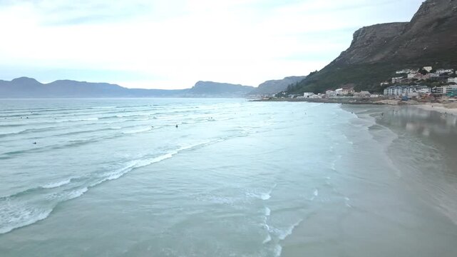 Muizenberg beach on a quiet cloudy morning in Cape Town, South Africa.