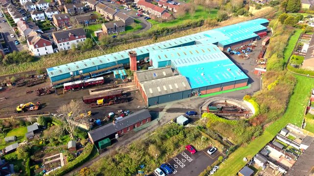 Top-down 4K 60FPS aerial video of Whitehead Railway Museum in Whitehead, County Antrim, Northern Ireland in the UK. Produced with Rec709 color.