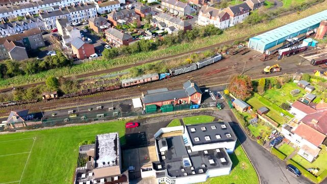 Anti-clockwise 4K 60FPS aerial video of Whitehead Railway Museum in Whitehead, County Antrim, Northern Ireland in the UK. Produced with Rec709 color.