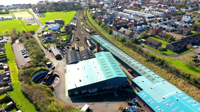 Rotating 4K 60FPS aerial video of Whitehead Railway Museum in Whitehead, County Antrim, Northern Ireland in the UK. Produced with Rec709 color.