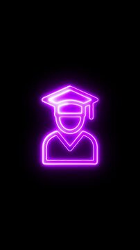 Neon-lit graduation cap sits atop a person's head in darkness