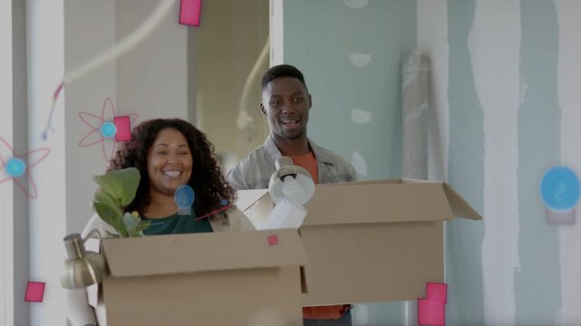 Couple entering renovating home carrying boxes with plant lamp, pink blue shapes over them