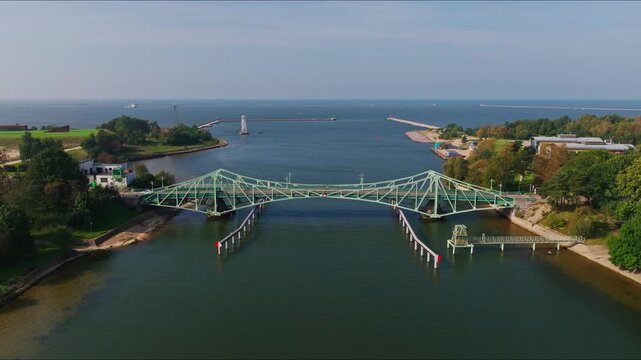Forward drone flight reveals naval swing bridge guarding Baltic Sea port entry