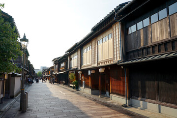 Fototapeta premium Quiet Traditional Japanese Street Lined With Wooden Tea Houses and Historic Shopfronts