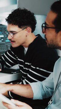 Teamwork, programming and men in office, tablet for software development and conversation. People, programmer and employees in meeting, IT specialist and discussion for password server and coding
