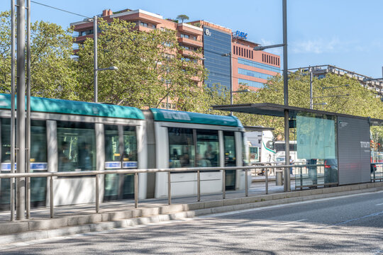 Tram in Motion Blur at Numancia Station, Diagonal Avenue, Urban Public Transport, Barcelona