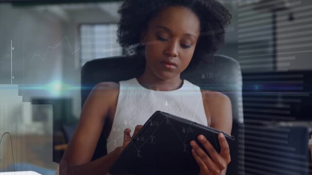 Woman tapping tablet on desk and scrolling, reviewing reports, spawning animated business charts