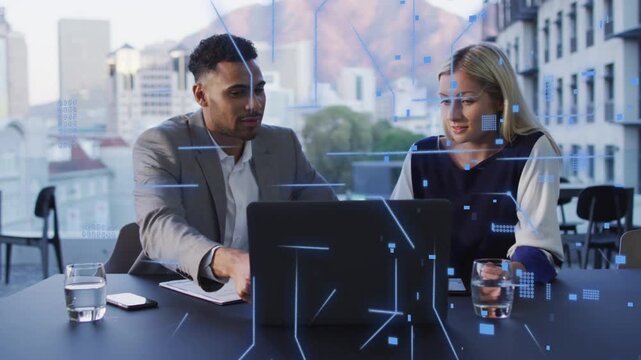 Manager pointing at laptop causing business HUD while peer checking notepad HUD settling agreeing