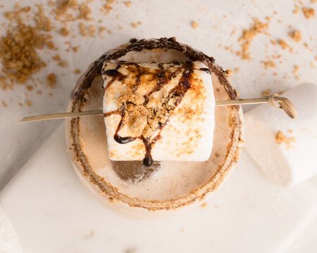 overhead view of a s'mores milkshake photographed in a studio
