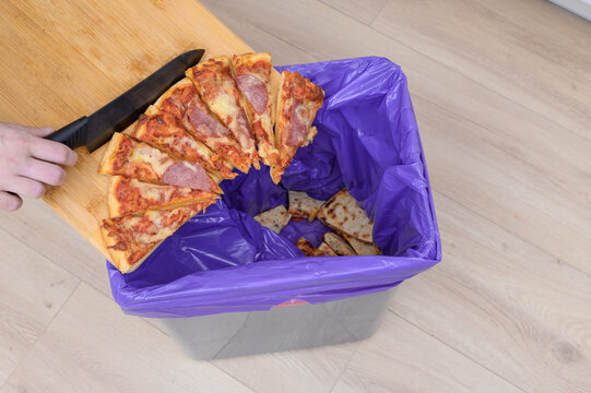 buying too much food and throwing the excess away, overeating