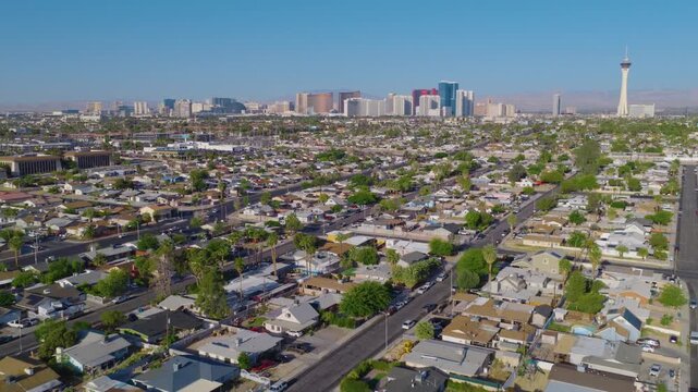 Sunlit Las Vegas Suburban Neighborhood Facing The Distant High-Rise Skyline