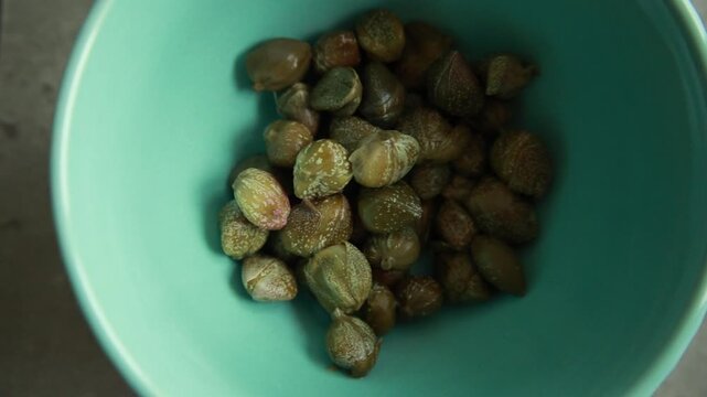 Close-Up of Pickled Capers in a Small Bowl