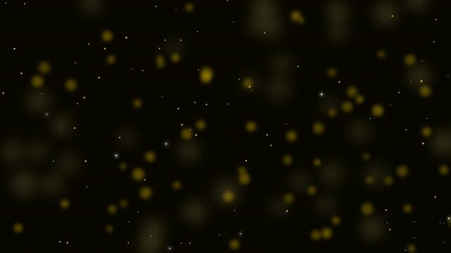 A mesmerizing display of glowing particles floating against a deep black background